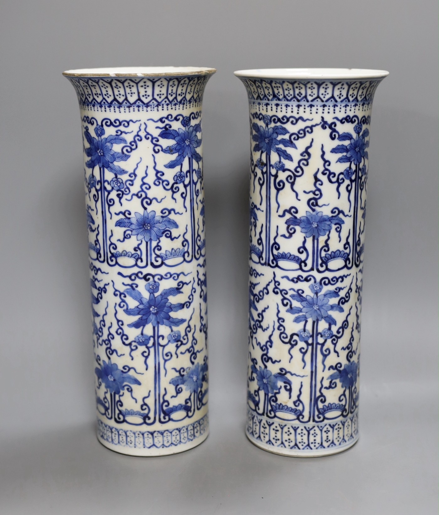 A pair of 19th century Chinese blue and white sleeve vases 30.5cm